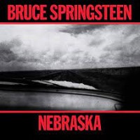 Bruce Springsteen Nebraska album cover with black and white photo of a lake and sky